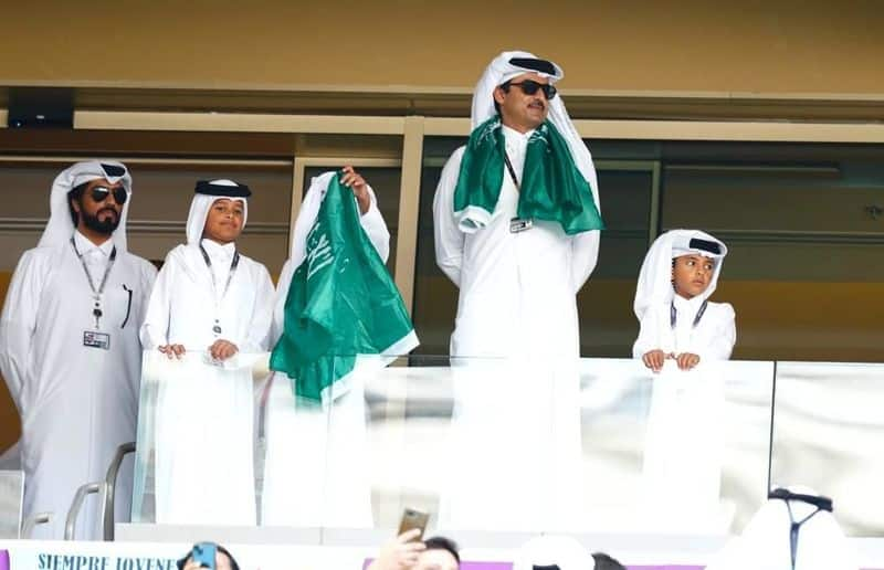 Watch:Qatar Emir Sheikh Tamim bin Hamad carrying Saudi Arabias flag 