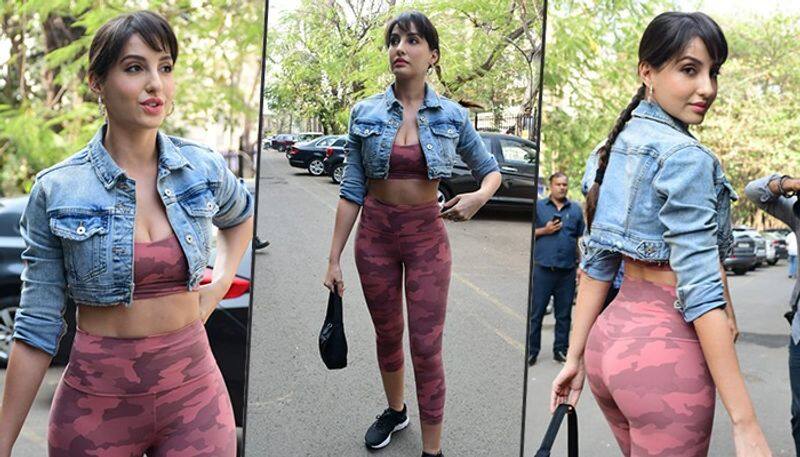 SEXY Pictures: Nora Fatehi flaunts perfect curves in sports bra and tights; gears up for Qatar World Cup 2022 show snt