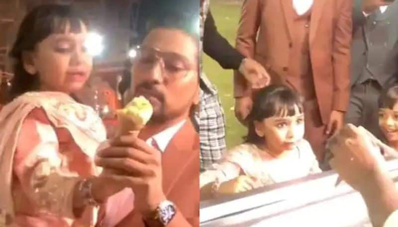 ice cream vendor playing with small girl but netizens criticize the act 