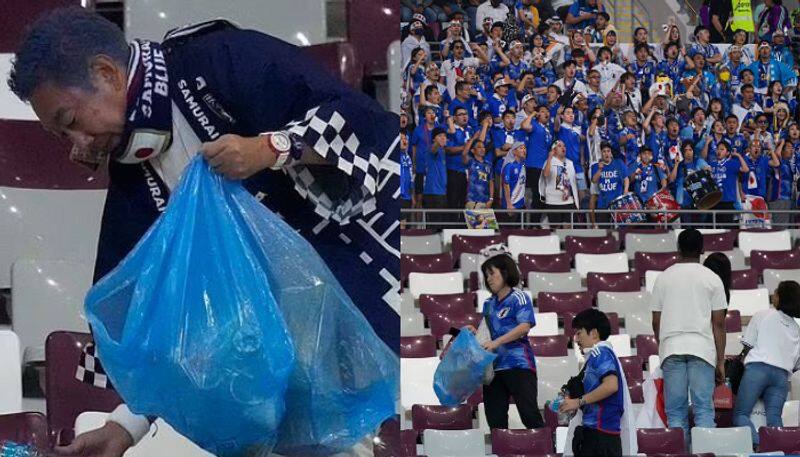 japanese fans cleans the gallery after the win over Germany