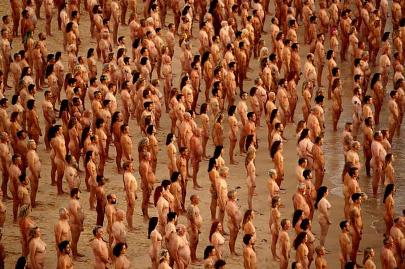 Thousands strip for cancer awareness photo shoot in  Australia