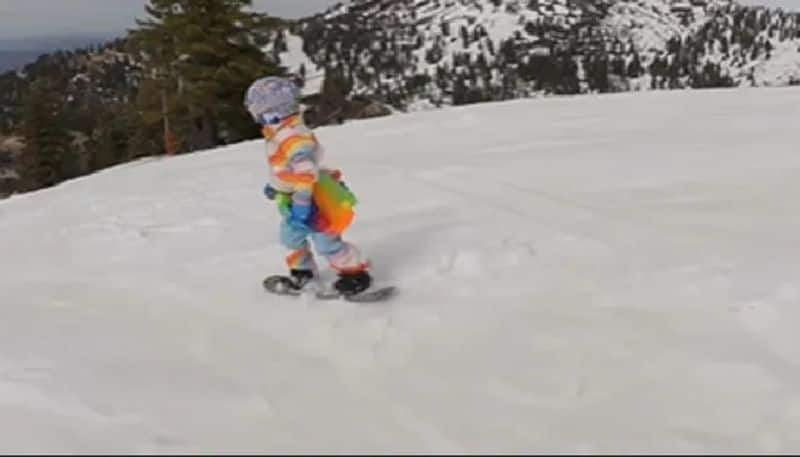 girls cute singing while snowboarding goes viral