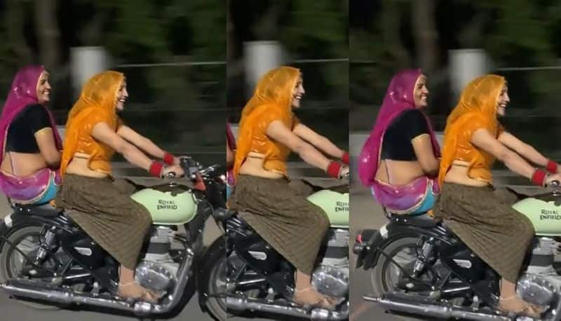 women raiding bullet wearing saree video goes viral in social Media akb