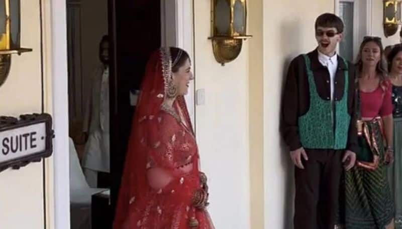 bride from us wears indian outfit on her wedding day 