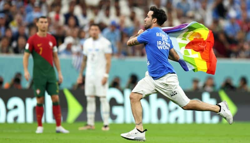 fifa world cup pitch invader Mario Ferri prasies qatar police