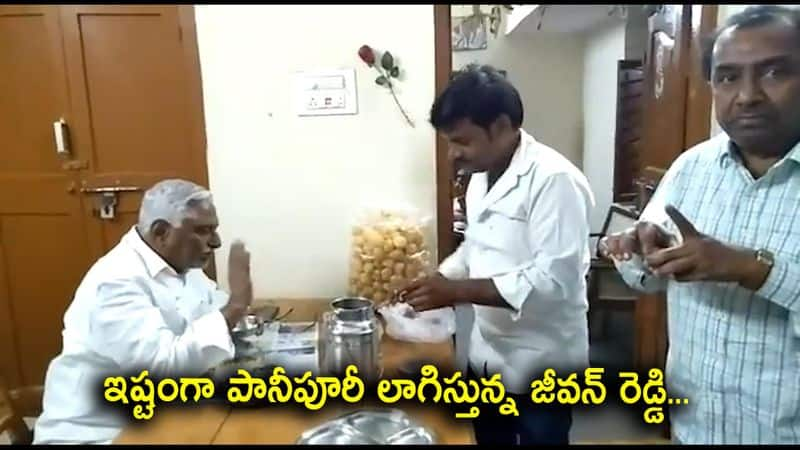 Congress MLC Jeevan Reddy eating panipuri