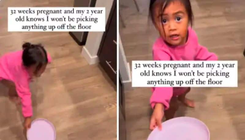 2 year old knows exactly how to take care of her pregnant mother