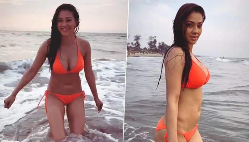 Namrata Malla SEXY video, pics: Bhojpuri actress sets the internet on fire in orange bikini at a beach RBA