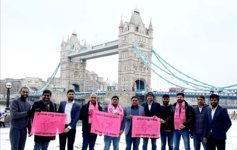 nri brs leaders host brs flag in london tower bridge