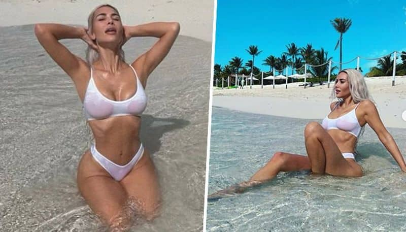 Kim Kardashian SEXY bikini pics: SKIMS founder enjoying beach vacay in see-through top RBA