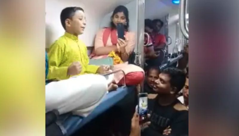 8 Year Old Boy Enthralls Train Passengers With His Classical Music Performance