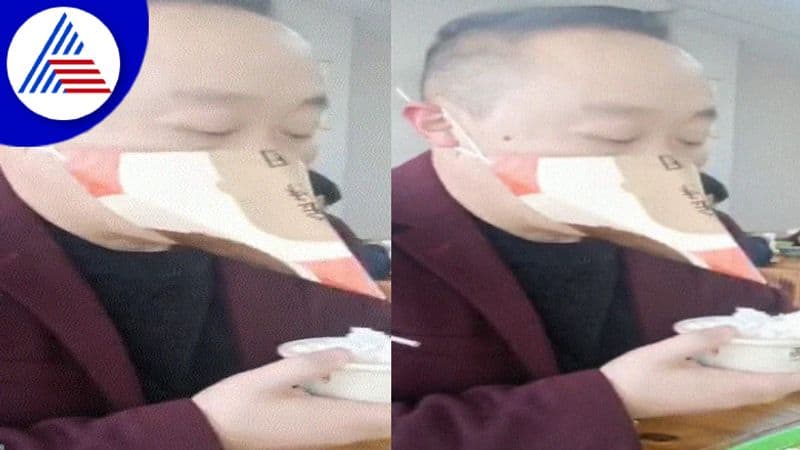 Man Uses Beak-Shaped Face Mask For Eating At Restaurant Vin