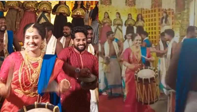 Bride and groom enters to wedding auditorium  with chendamelam  