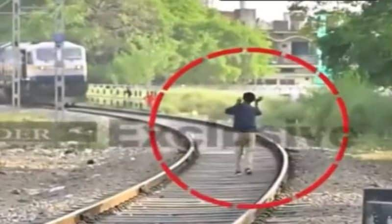 drunk man stops moving train 