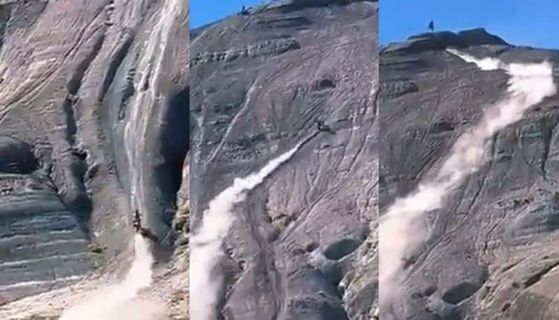 Mans adventure in rock mountain Riding Motorbike On Steep Rocks video goes viral akb