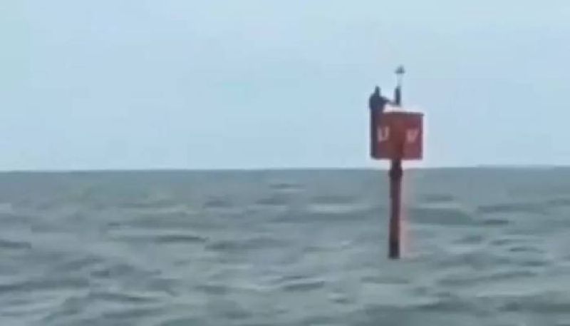 fisherman fallen from boat survived two days in signal buoy 