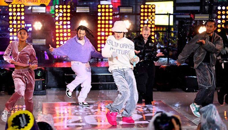 Video and Pictures  BTS' J-Hope performs at Times Square on New Year's eve in the rain RBA