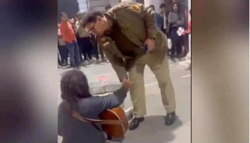 police Stops Mans Guitar Performance