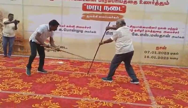 minister gingee masthan rotates silambam and video is going viral