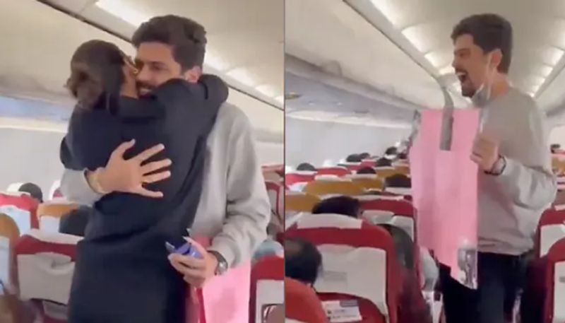 Man Surprises Girlfriend On Flight Proposes MidAir Video Goes Viral