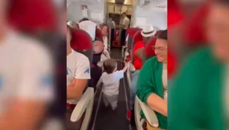 Toddler Greets Every Person In The Flight