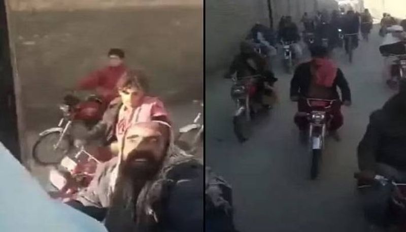 people chasing wheat truck video from Pakistan