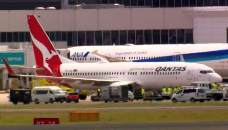 Qantas flight QF144 lands in Sydney after mayday call about engine failure