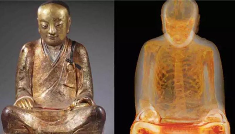 monks remains inside 1000 year old Buddha statue 