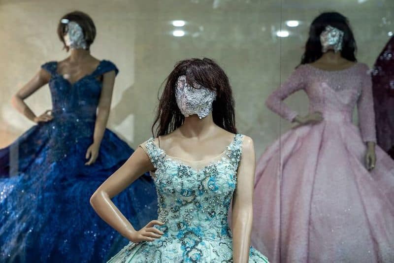 Afghanistan shopkeepers cover female mannequins' faces under Taliban rules