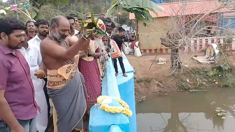 village people celebrating 100th year of small dam in nagapattinam