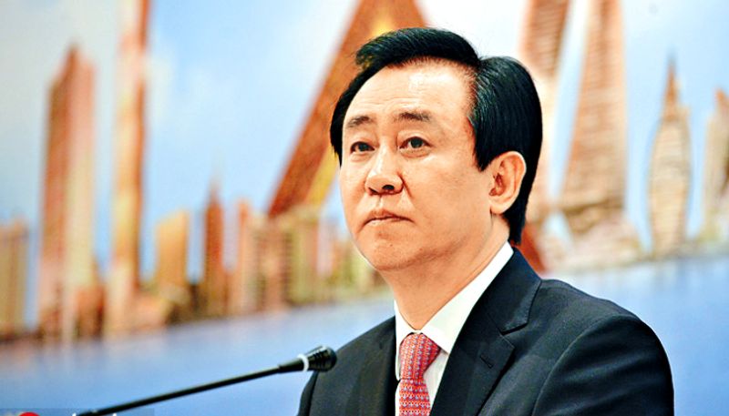 crisis deepens chairman of beleaguered property developer China Evergrande Group Hui Ka Yan under police custody says Bloomberg report etj