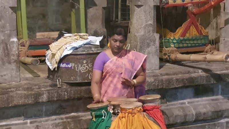 a traditional musical instrument is played by woman first time in thiruvarur temple