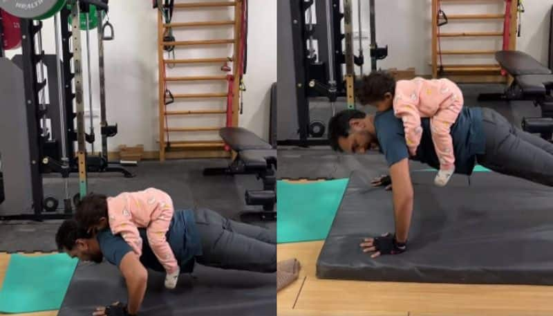 57 Year Old Man Does Pushups With Granddaughter On His Back