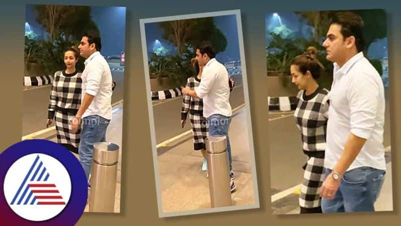 Arbaaz Khan and Malaika Arora hug after dropping son Arhaan at the airport