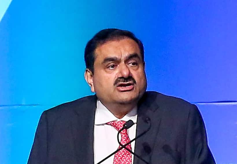 Stocks from Adani Enterprises keep Nifty in red; Sensex trading flat