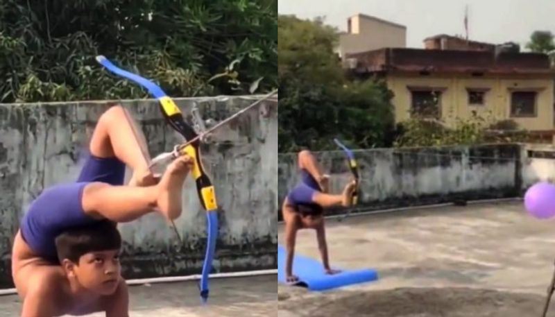 Viral Video Of Archer Boy Hitting Target By Arrow With Bent Body azn