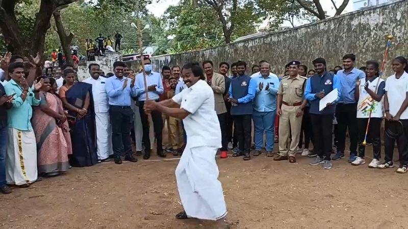 minister mano thangaraj swing a silambam with sports athletes in kanyakumari