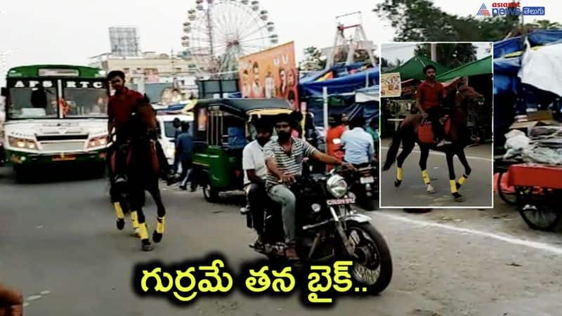 A young man enjoying riding a horse in Uyyuru, andhrapradesh - bsb