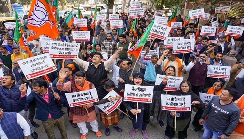 Delhi liquor scam: BJP workers stage protest outside AAP office against CM Arvind Kejriwal AJR