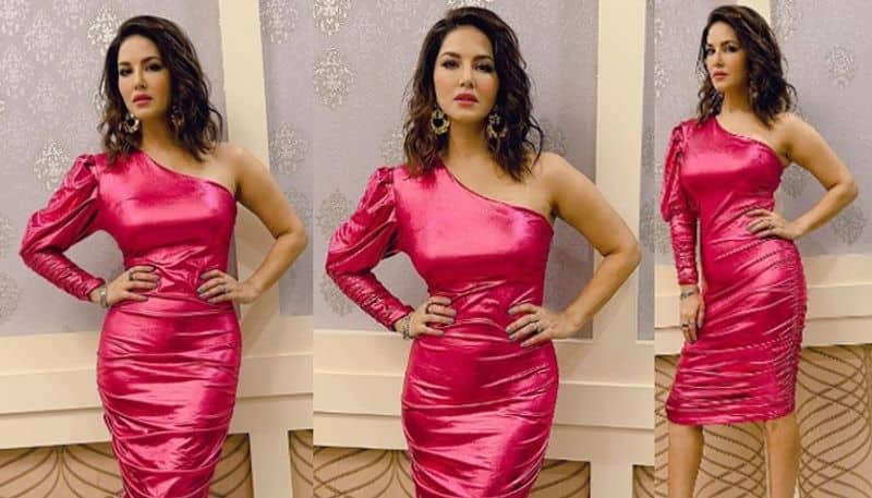 Sunny Leone stunning photoshoot in pink tightfit