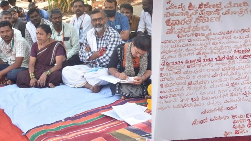 Dharwad Demanding Re appointment of Water Supply Employees wrote letter to PM, CM   with blood akb