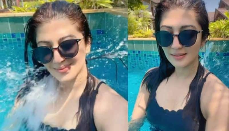 Actress Pranitha Subhash stunning poses in swimming pool