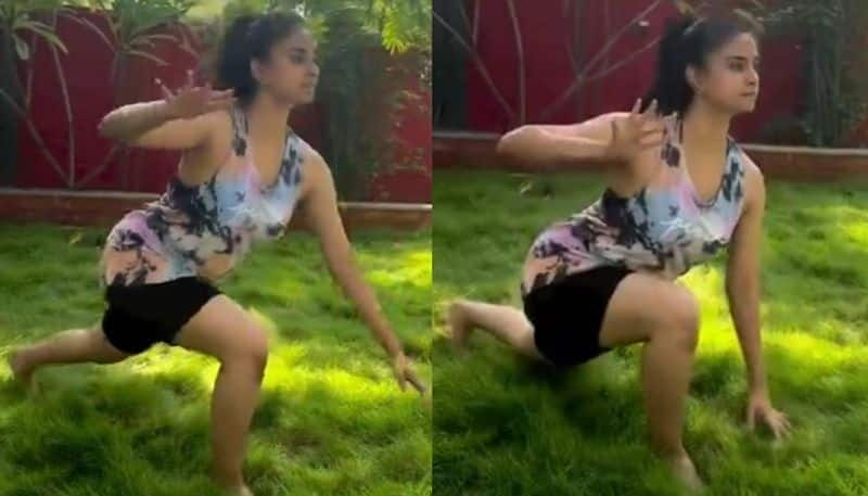 Actress Keerthy Suresh yoga poses in mini dress