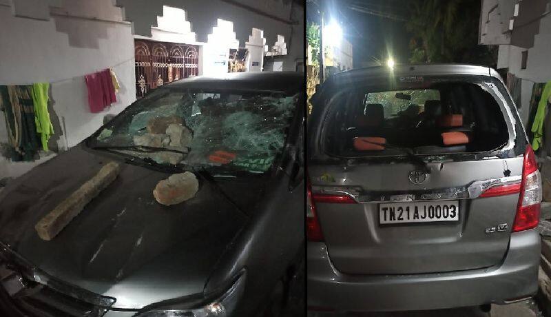 stone thrown on bjp executives car and breaked the whole car glasses