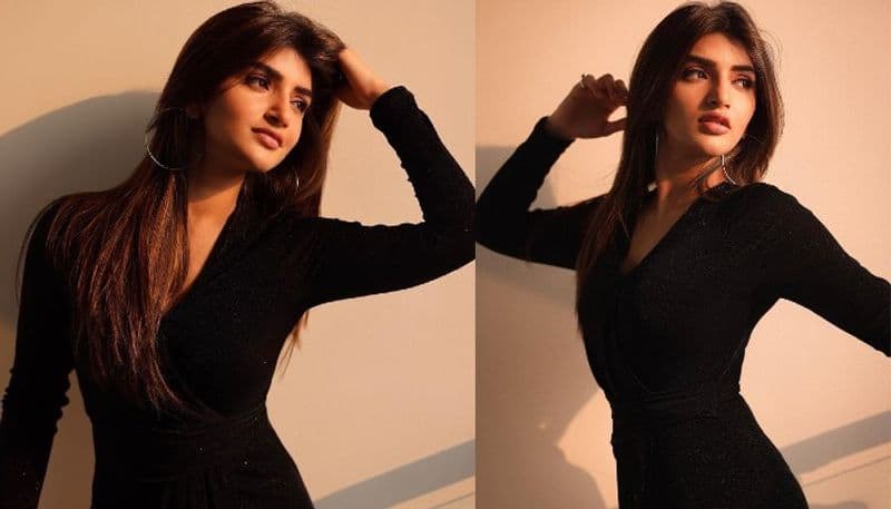 Young Actress Sreeleela stunning stills in black outfit