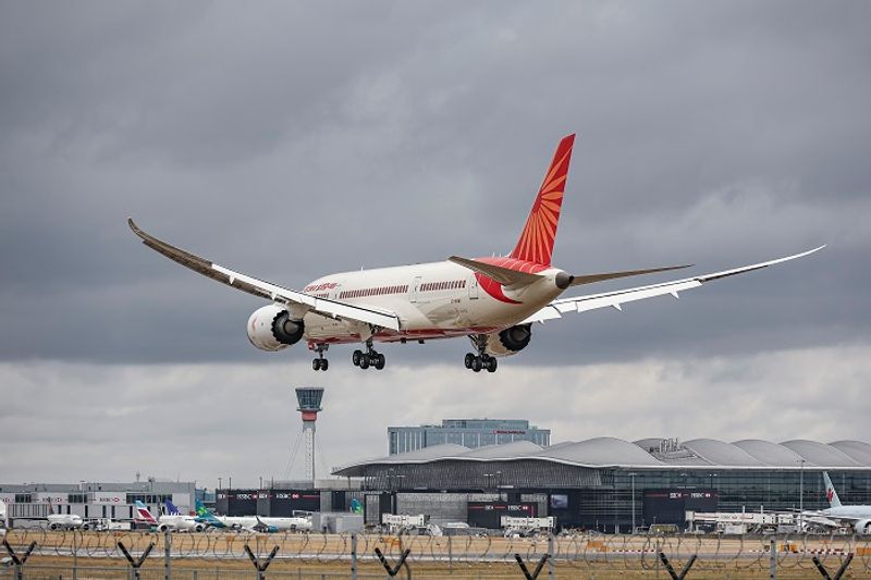 hoax bomb threat singpore fighter jets escort air india express safe landing