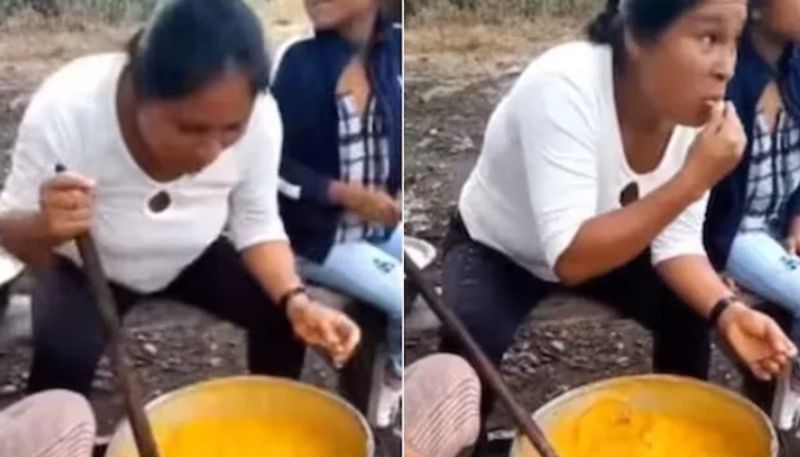 woman spitting into dish that she cooks hyp 