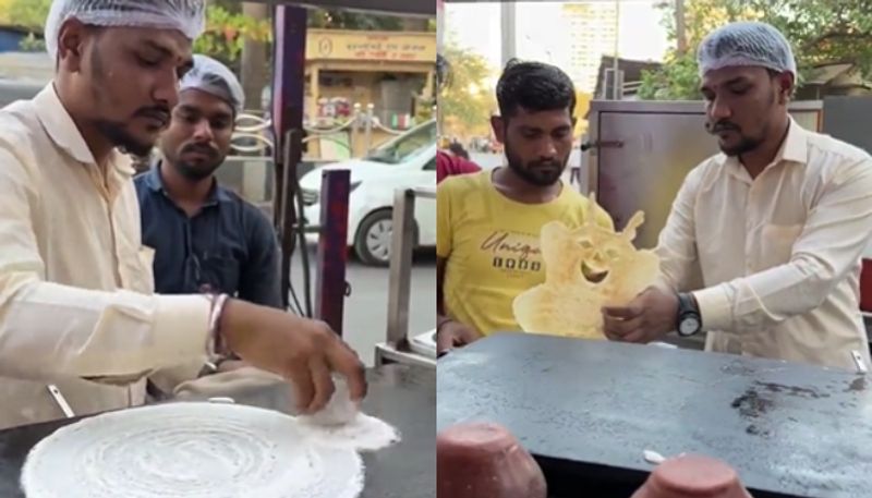 street vendor makes dosa that looks like a cat hyp