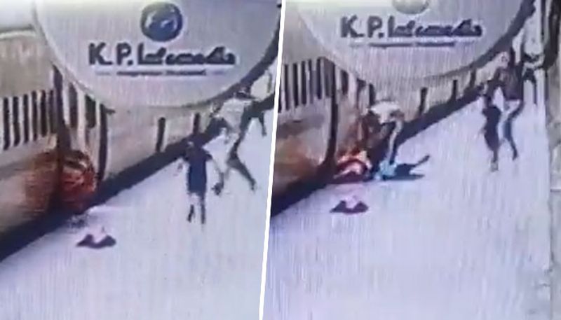 UP police saves woman, child who slipped while deboarding moving train in Kanpur; watch video - gps