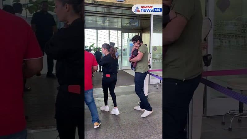 nayanthara and vignesh shivan with twin baby at Mumbai airport